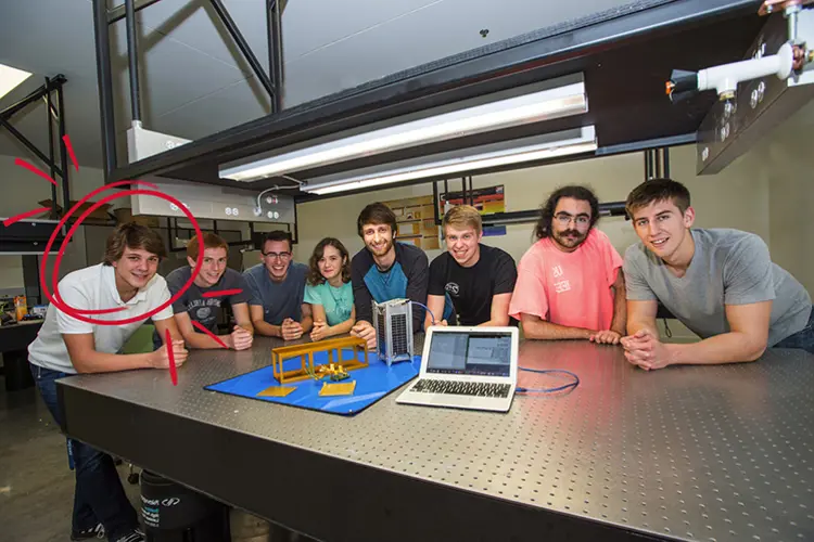 USI graduate Wyatt Helms with his CubeSat team