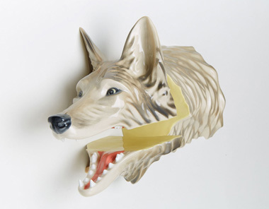 Wolf sculpture with upper quarter separated