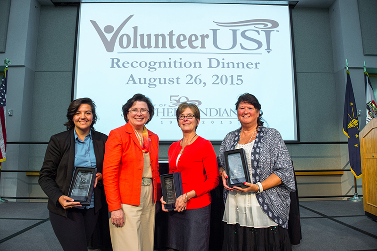 Left to right: Taynara Oliveria de Almeida (accepted award on behalf of Meschac Gervais, President Linda L.M. Bennett, Doris Allen and Karla Horrell.