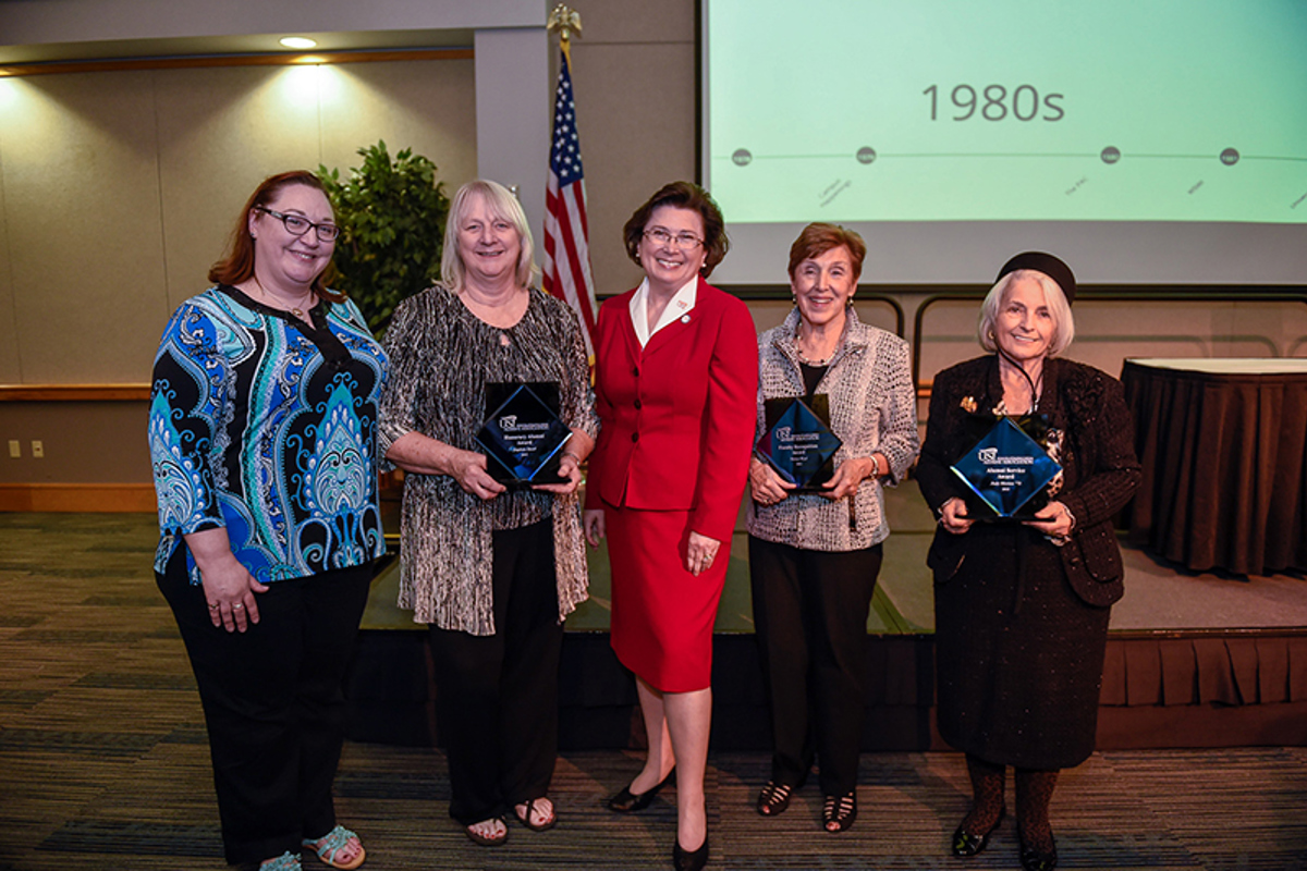 Left to right: Kate Small Scheu, Vicki Small, President Linda L. M. Bennett, Nancy Bizal and Judy Morton'73
