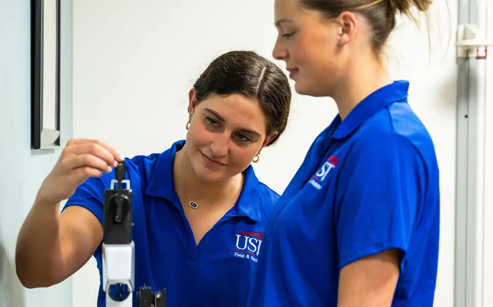 Students Measure Body Weight On A Traditional Scale