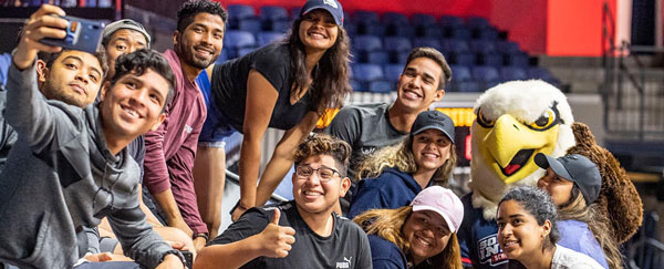 Students with Archie taking a selfie