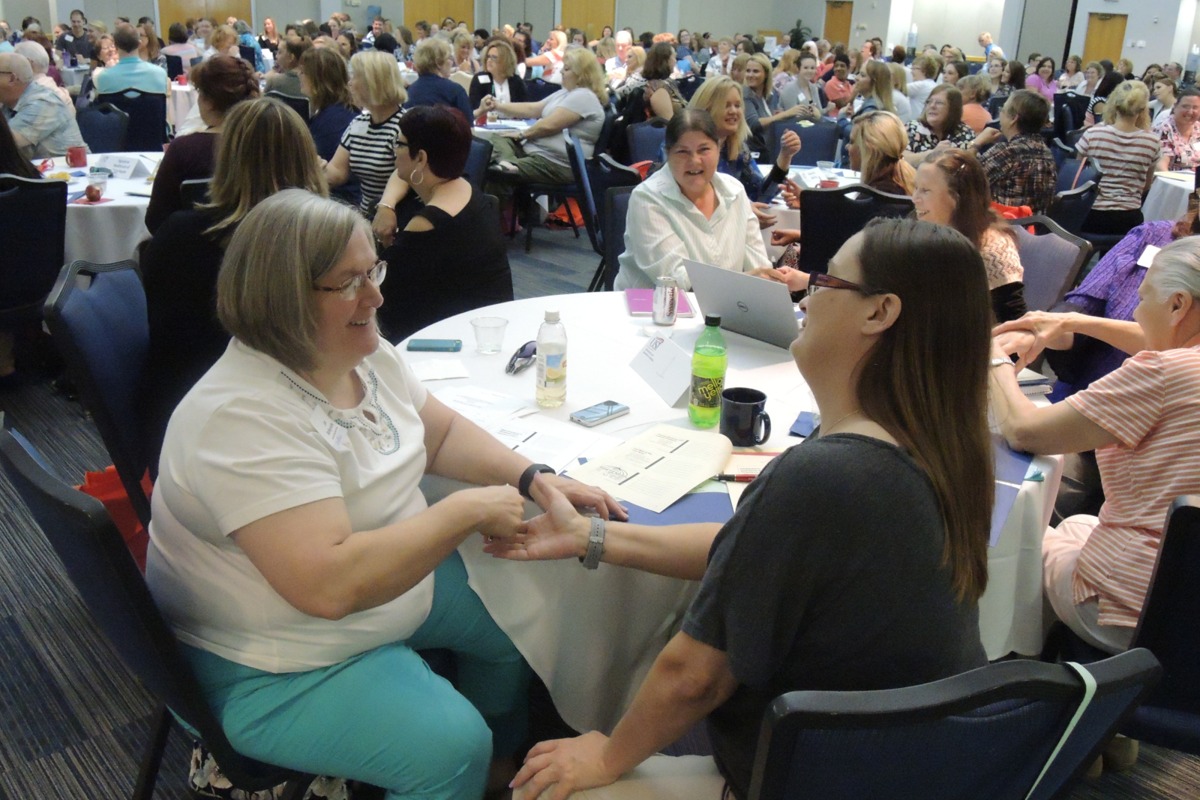 Attendees of the 2015 Mid-America Institute on Aging and Wellness participating in a training session led by Teepa Snow