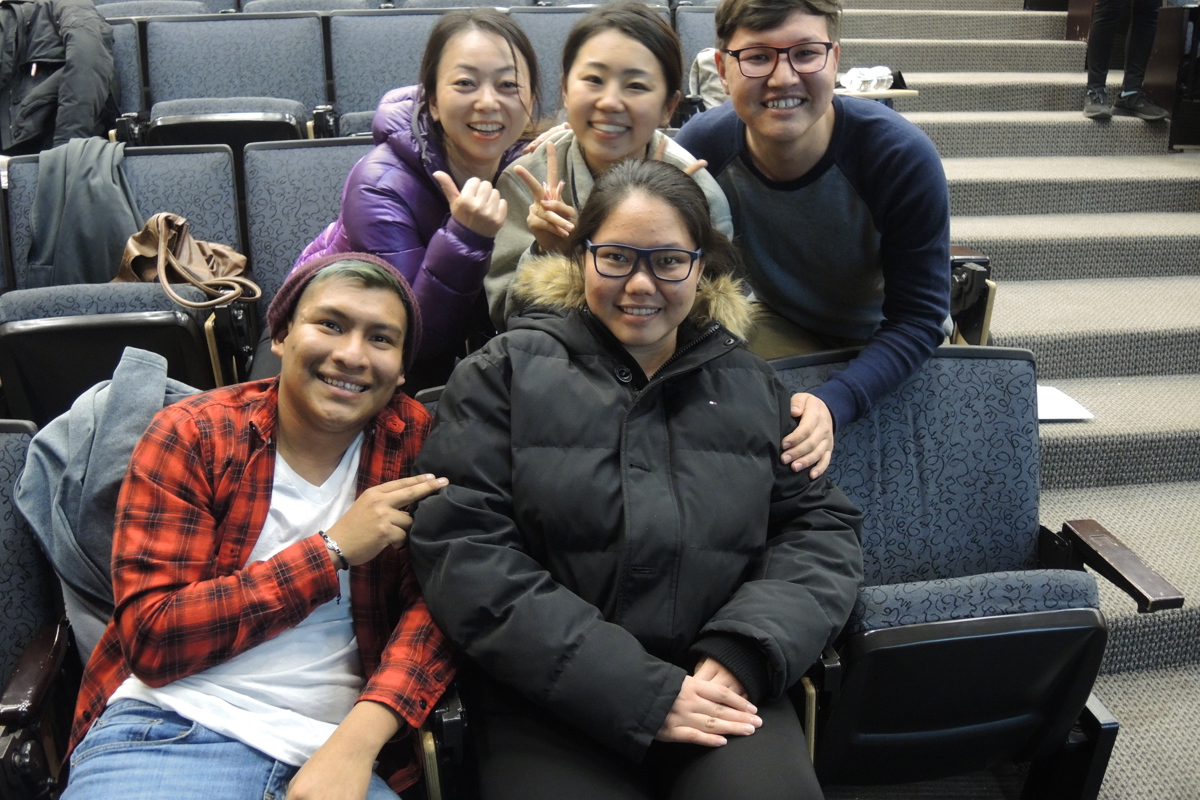 Intensive English Program students, teachers and staff pose following the program's first-ever spelling bee on Monday, December 3