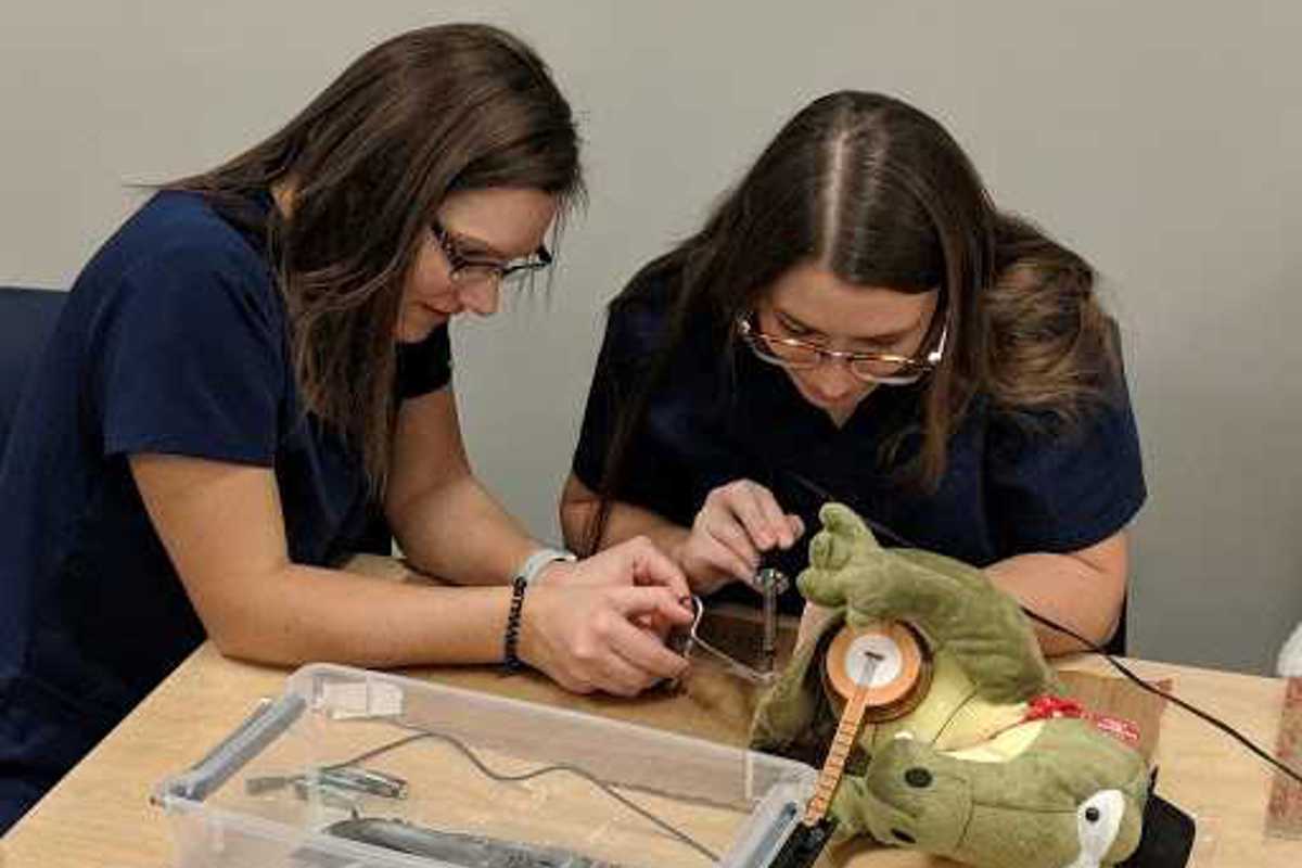 OT and OTA students adapt toys for EVSC students.