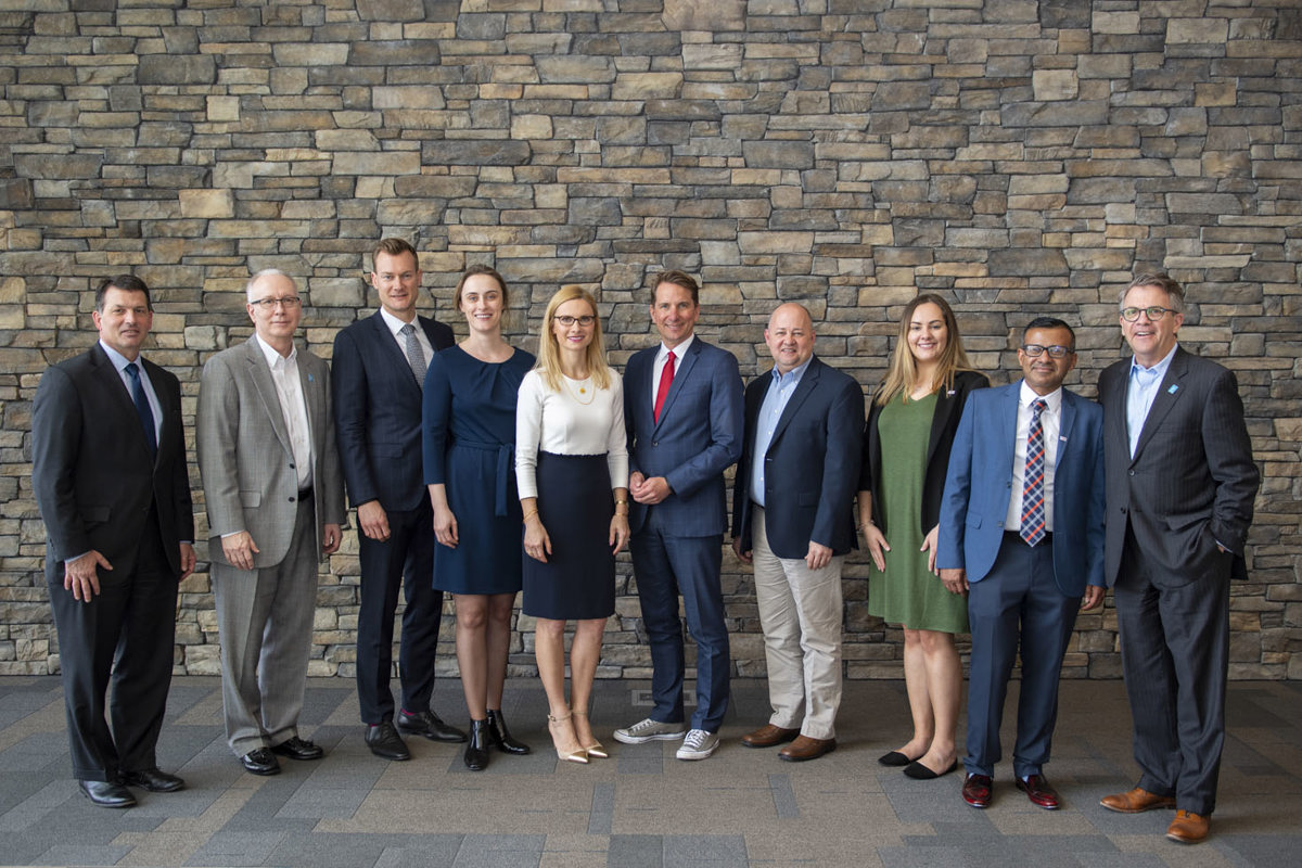 Members of a German delegation from Osnabrück pose with Dr. Daria Sevastianova (fifth from left), Dr. Sudesh Mujumdar (second from right) and other representatives from the Evansville area, including Mayor Lloyd Winnecke (far right), during the Employability: (Made) in Germany discussion panel and networking event held in the Griffin Center on April 17, 2019. 