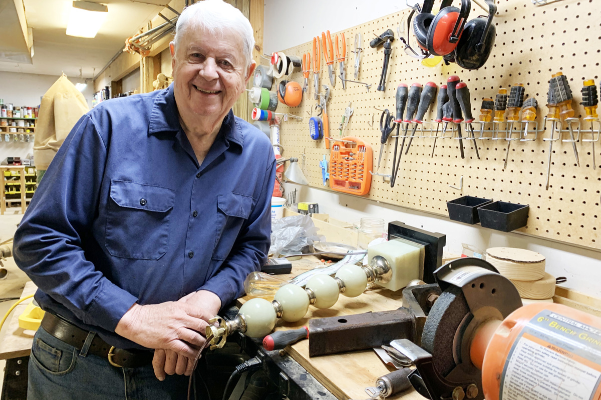 Dr. H. Ray Hoops, USI's second president, inside his workshop