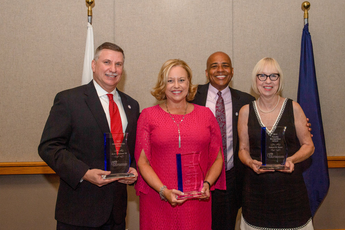 From left: Kevin Hammet '90, Penny Goshert, Dr. Ronald Rochon, Kathryn Waters