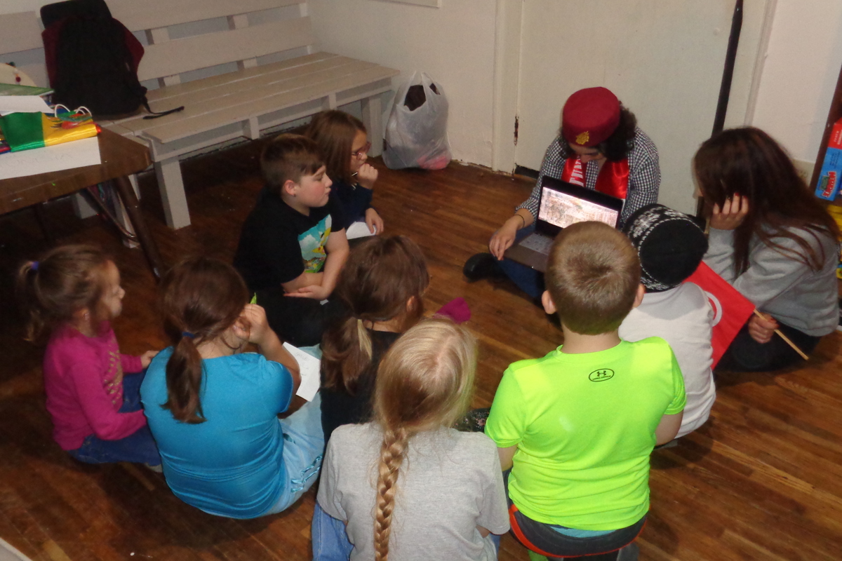 USI international students talk to students with the Southside Stars Youth Zone about their countries