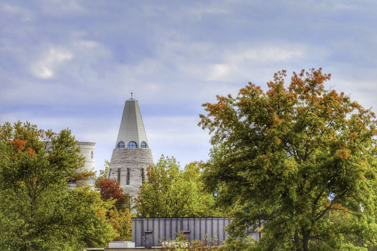 USI roundabout fountain with University Cone and trees in the background