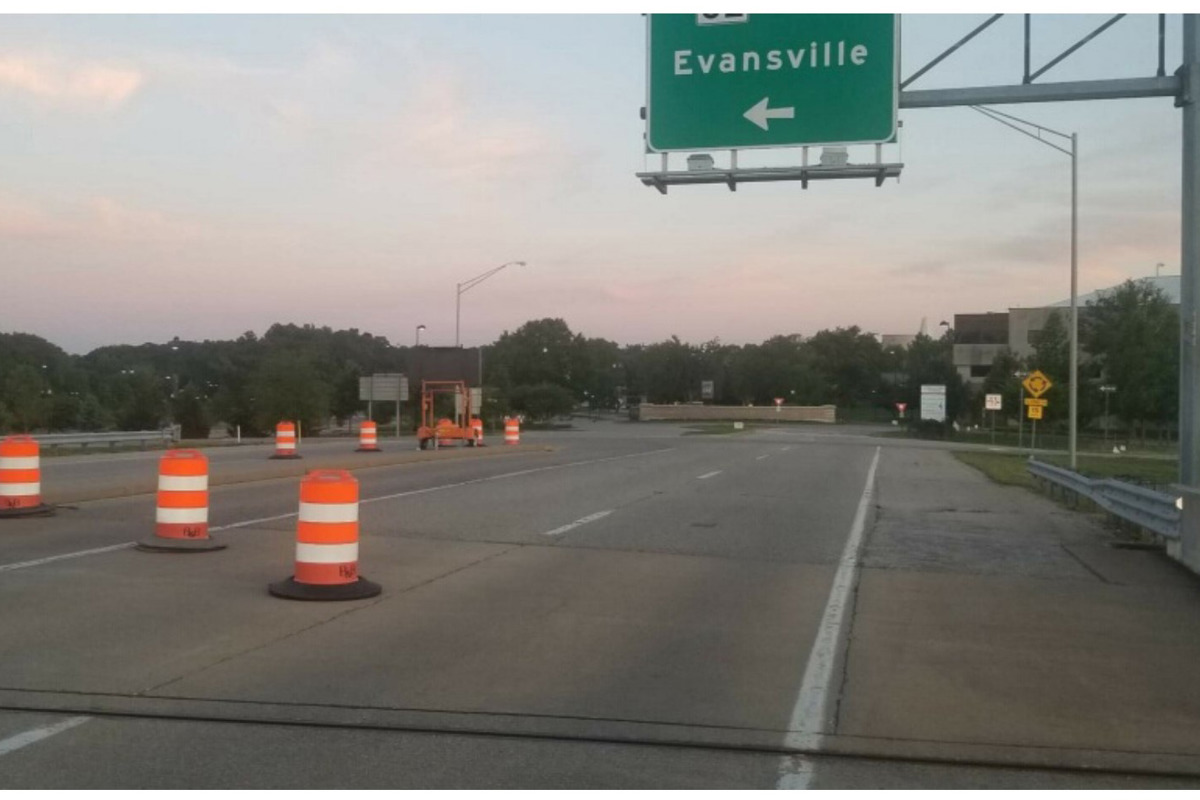 Orange barrels in place on the University Parkway bridge that spans SR 62 near the entrance of the USI campus