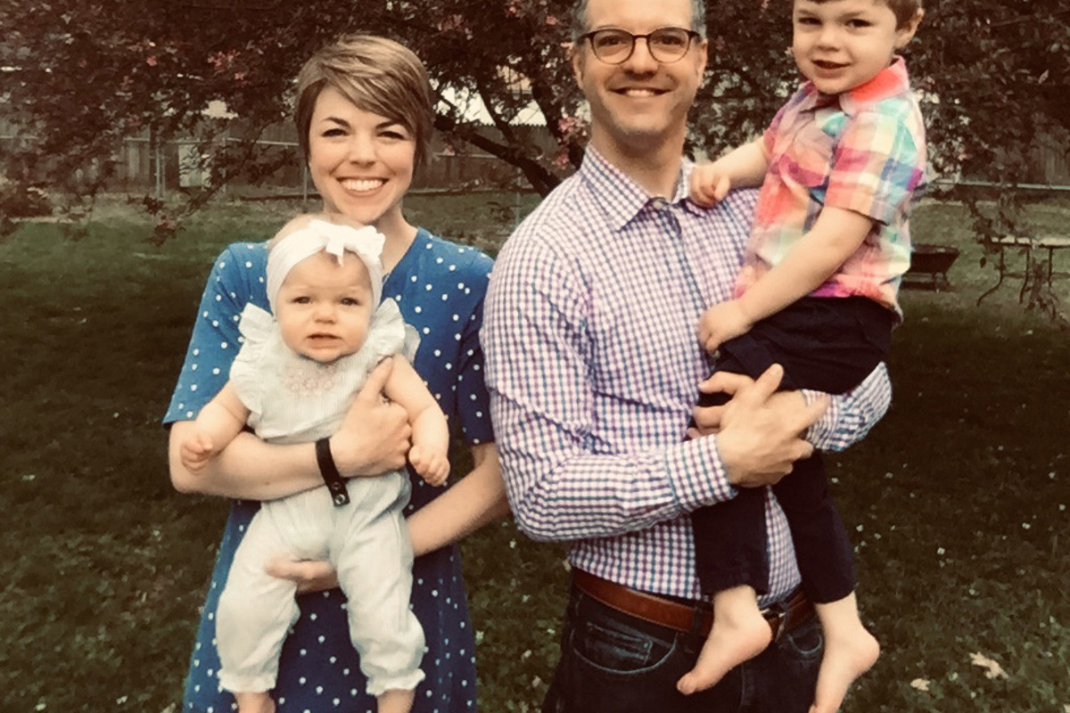 Caleb Fendrich with his wife and two children