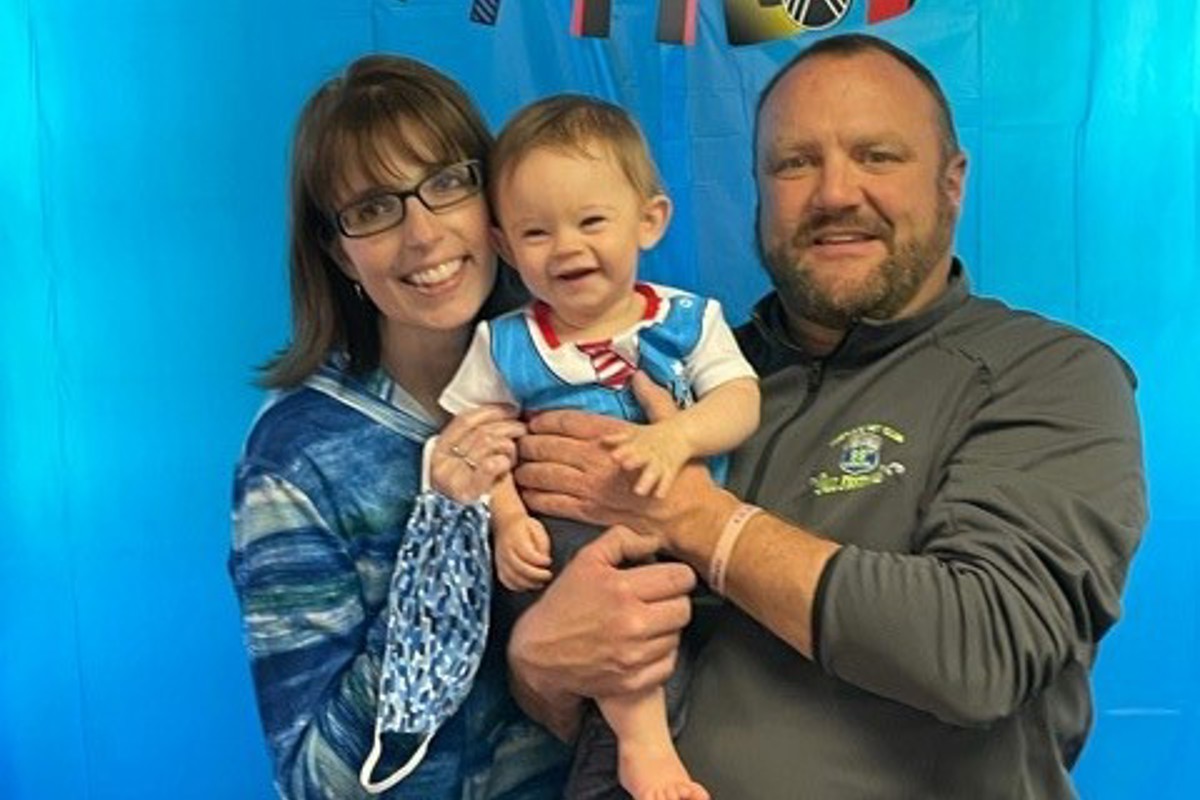 Jennifer Palmer, left, is excited to spend more time with her family - including her young grandson - after completing her master's degree.