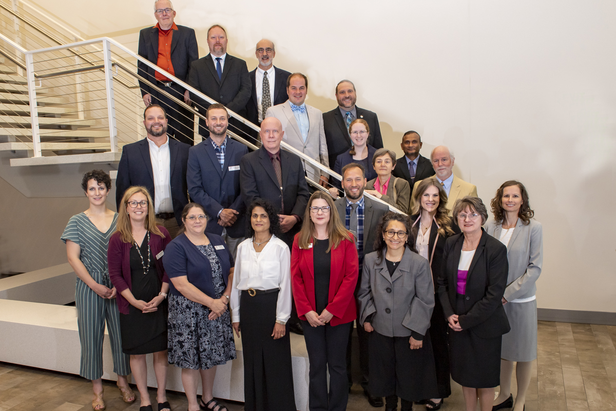 Bottom row, left to right: Ryan Butler, Alyssa Weatherholt, Charlotte Connerton, Priyadarshine Hewavitharanage, Marna Hostetler, Norma Rosas Mayen and Constance Swenty
Second row: Mark Creager, Chase Smith, Thomas McDonald, Arthur Chlebowski, Amanda Reddington and Urska Dobersek
Third row, stairs: Mikel Hand, Mark McKnight, Tony Maria, Bartell Berg, Rick Hudson, Misty Ostergaard, Susanna Hoeness-Krupsaw, Uditha Wijesuriya and David Black