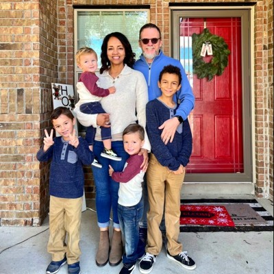 Ruth, her husband Ken and their four grandsons.