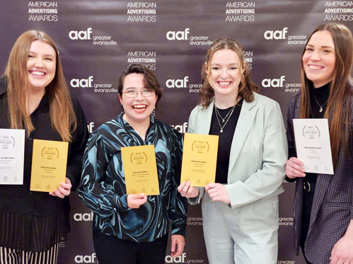 4 female students posing with their awards at the AAF awards ceremony