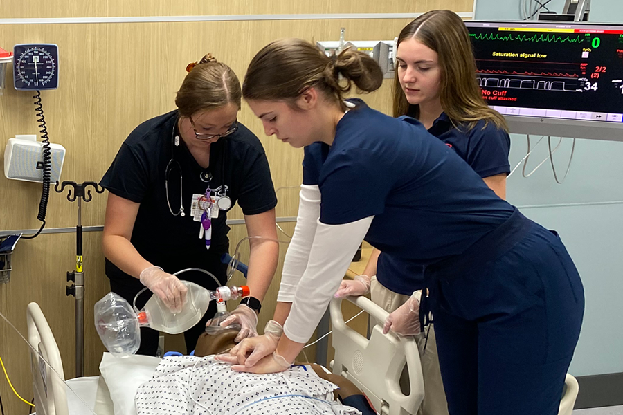 Respiratory Therapy students work together to revive a code blue practice patient
