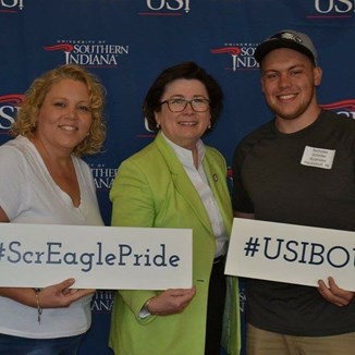 NIck with Linda Bennett and another student