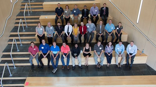 students on the atrium steps