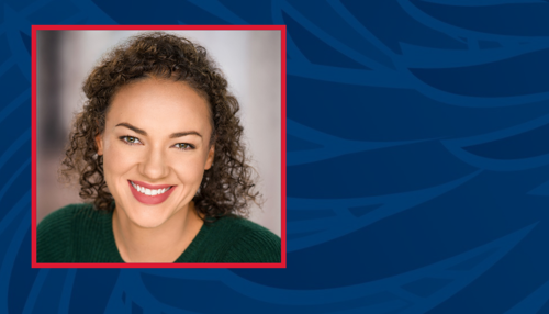 Carlysle Garland Portrait: woman of color with short curly medium brown hair and green sweater