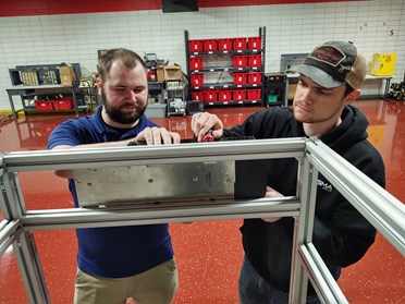 Students work on a project together in the Applied Engineering Center