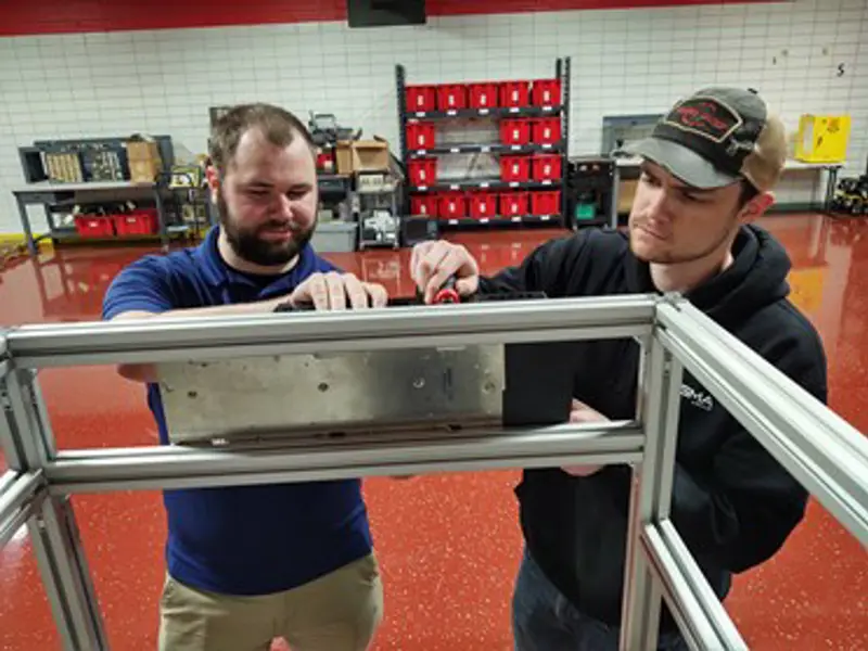 Students work on a project together in the Applied Engineering Center