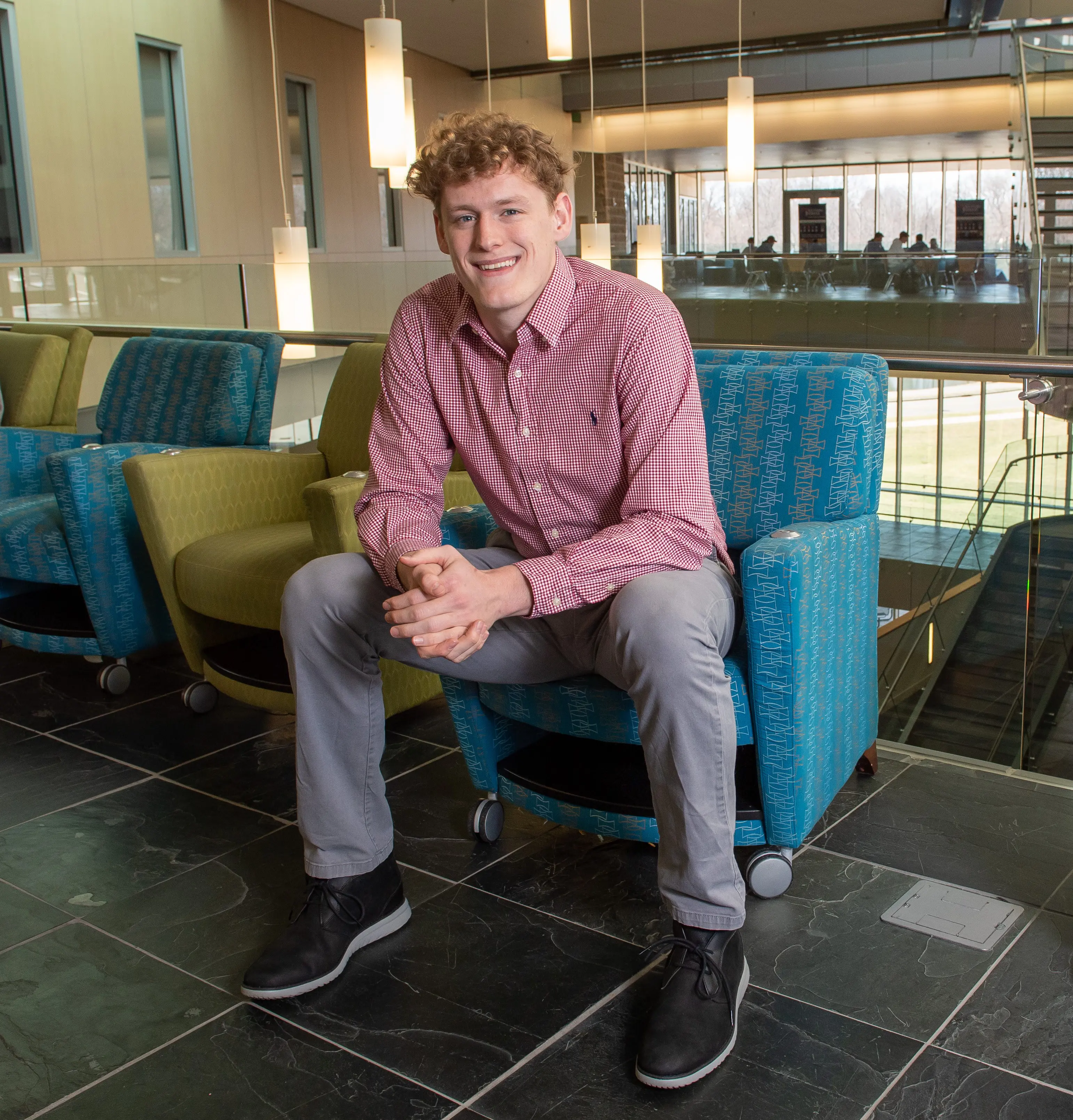 Jacob Polakovich in Romain atrium at USI