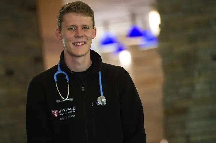 USI pre-med graduate Evan Stieler portrait with stethoscope