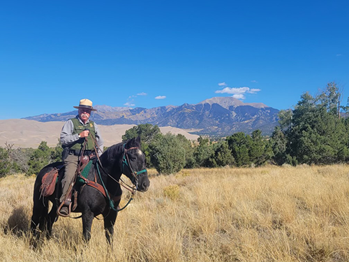 National Park Service ranger on a horse
