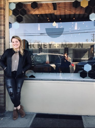 Elizabeth in front of store front