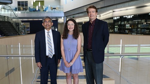 Shelby shown here with Dr. Mohammed Khayum, dean of the Romain College of Business (left), and Dr. Brian McGuire, associate dean and interim chair of accounting and finance.