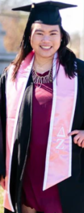 light pink stole with white trim and white Greek Delta and Zeta letters on one side