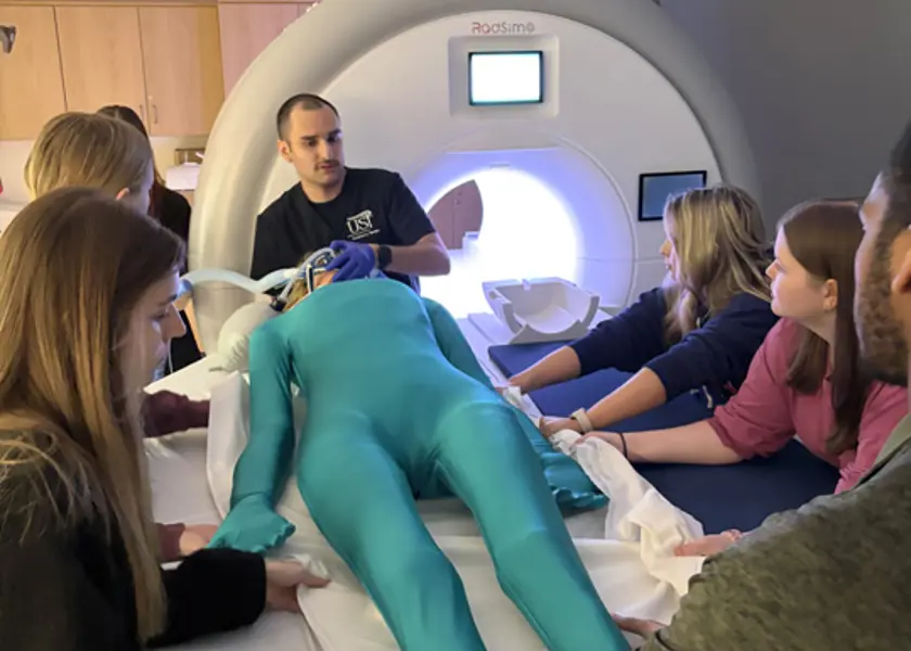 Respiratory Therapy students work on a simulation with Radiologic Technology students