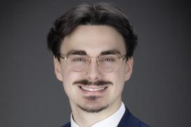 Professional headshot of Timothy Rosignol.