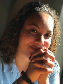 Portrait of Erica Richardson in window