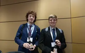 Members of the AMA Chapter pose with their design for Sprecher Root Beer