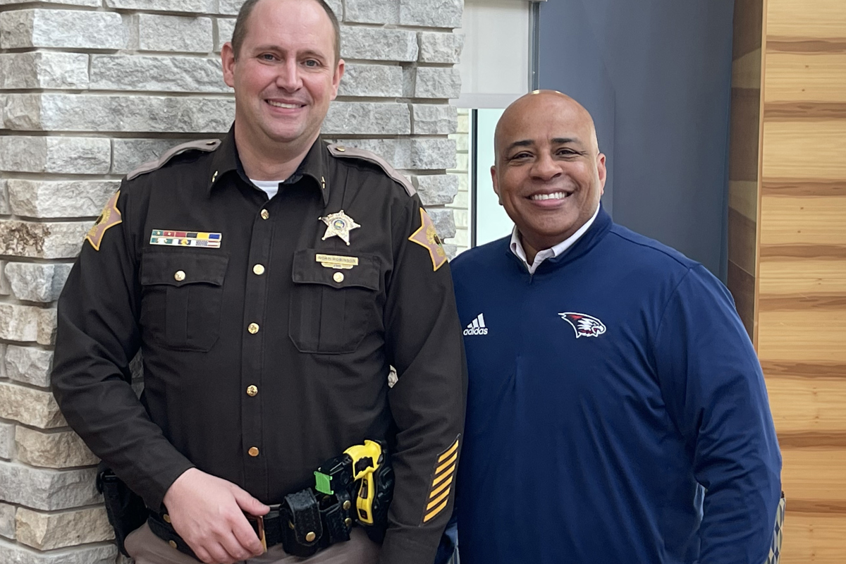 Vanderburgh County Sheriff Noah Robinson and Dr. Ronald S. Rochon, USI President.