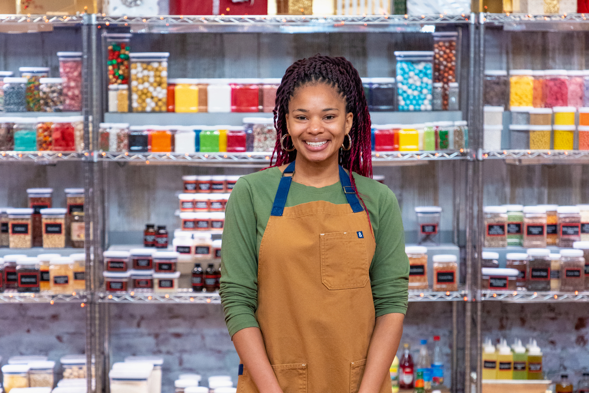 Dr. Brandi Neal, Post-Doctoral Fellow in Student Affairs, on the set of Food Network’s Holiday Baking Championship: Gingerbread Showdown.