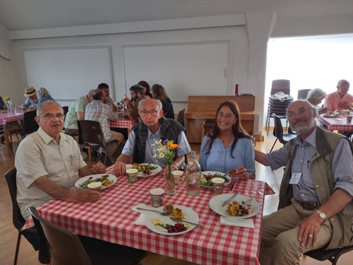 Founding ICSA Members seated around a table