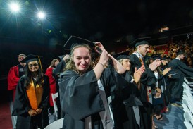 A student turns her tassel at a Commencement Ceremony in Liberty Arena, Home of the Screaming Eagles.