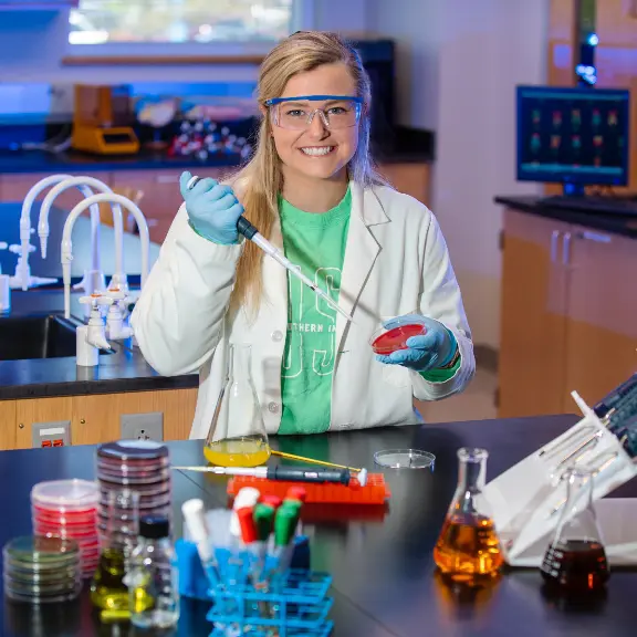 Jennifer Leonhardt in a medical lab with safety glasses